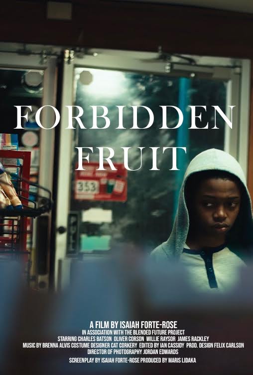 a young Black boy in a light grey hoodie walking through a convenient store with the title of the film "Forbidden Fruit"